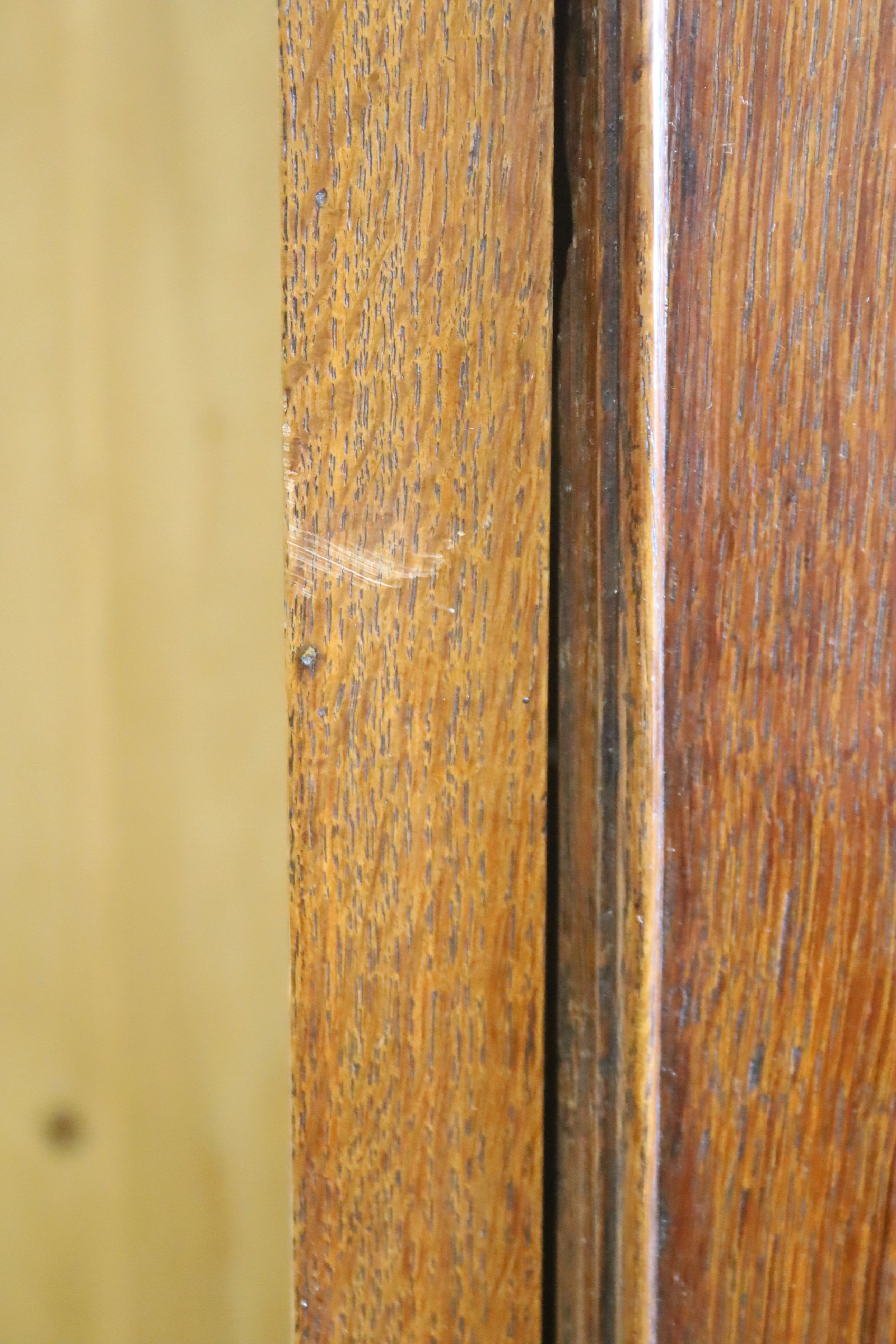 An early 19th century oak eight day longcase clock, marked Cousens Langport, height 194cm